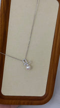 Cute Butterfly with a Pearl Necklace