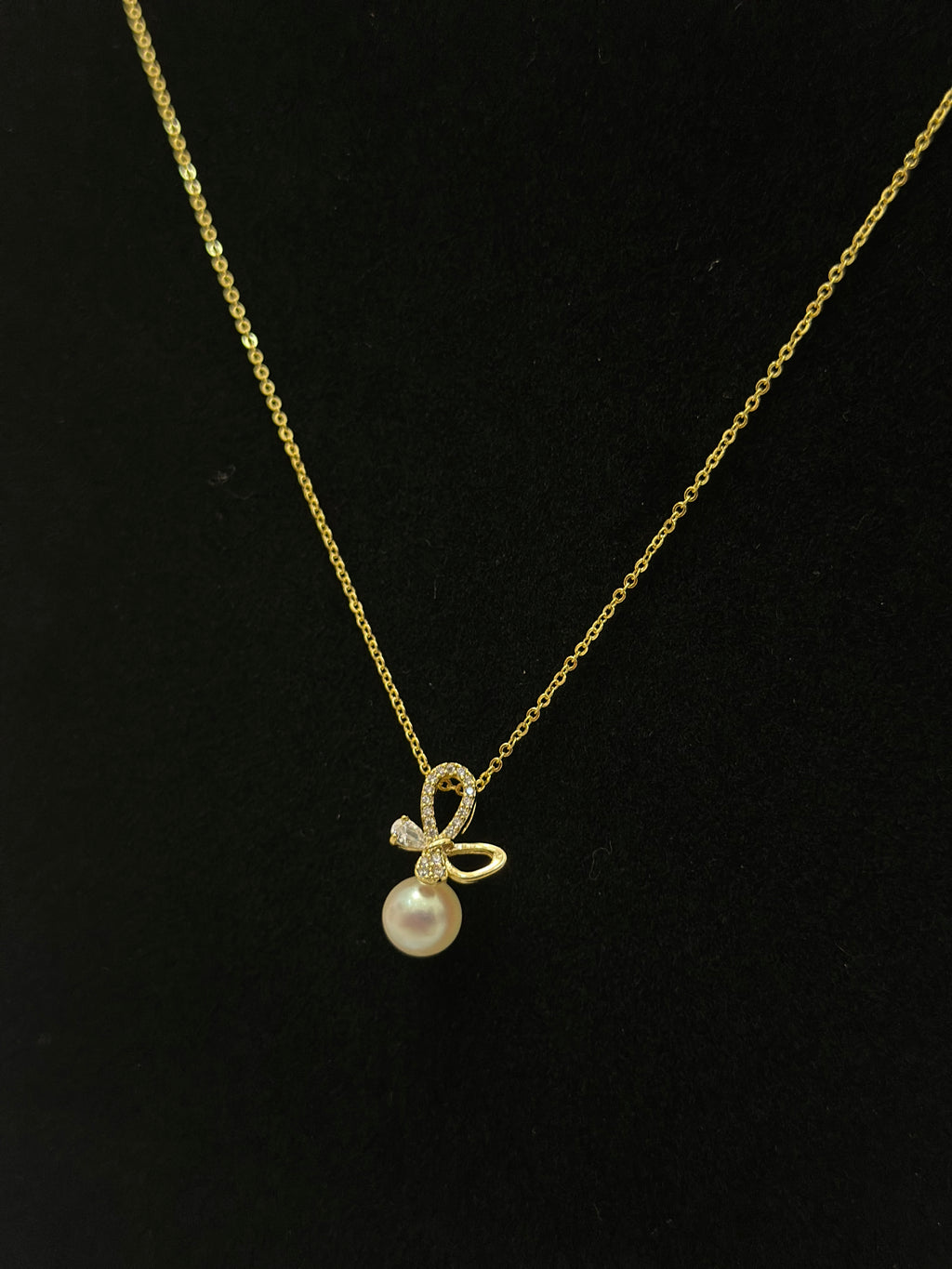 Cute Butterfly with a Pearl Necklace