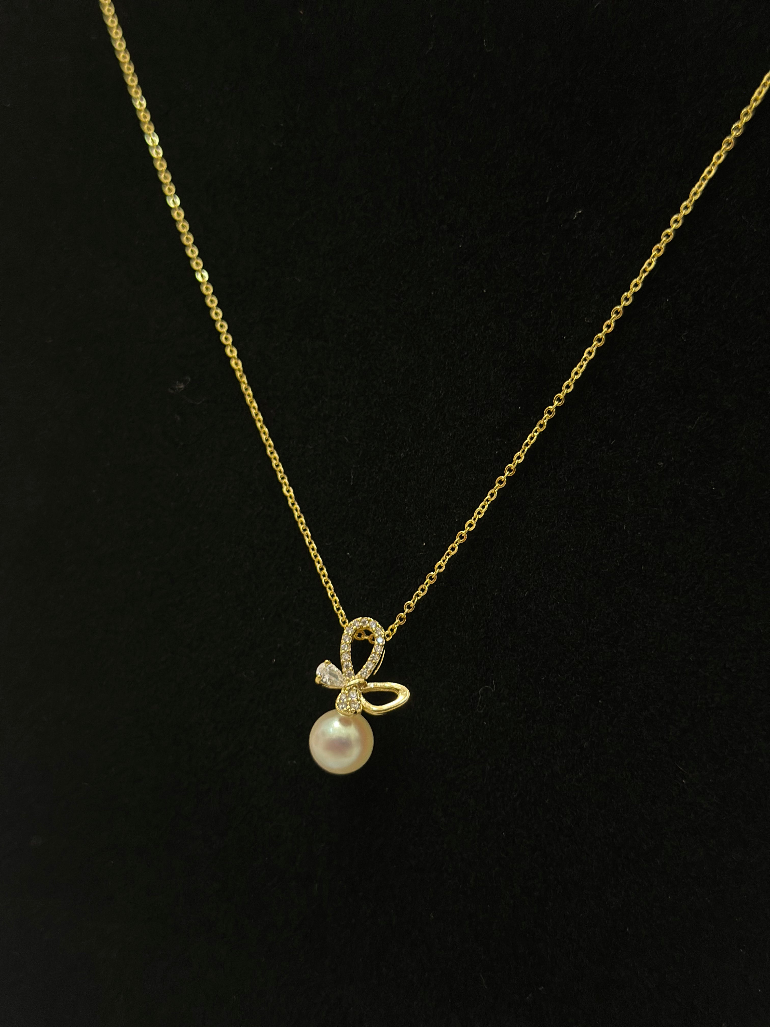 Cute Butterfly with a Pearl Necklace