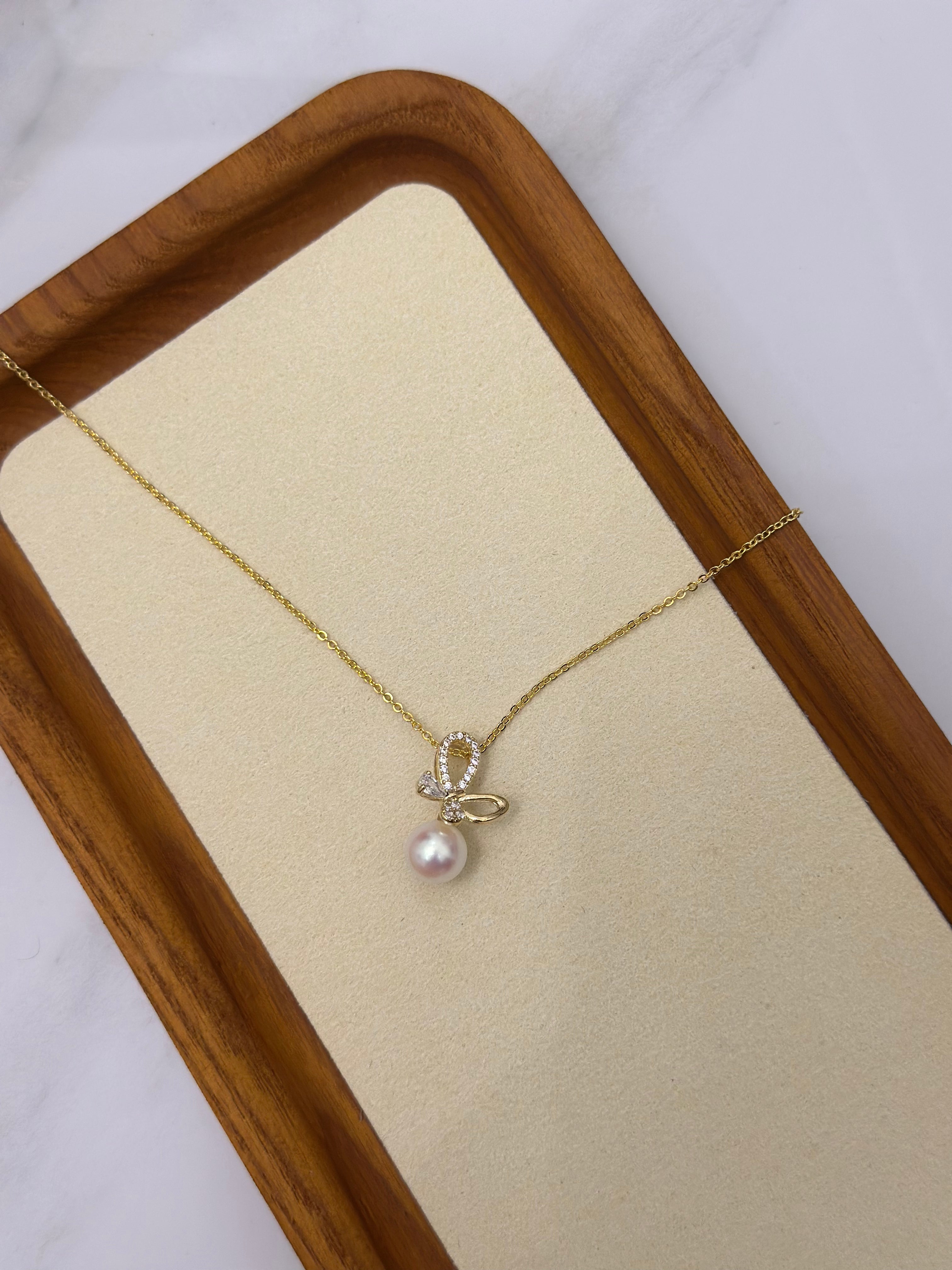 Cute Butterfly with a Pearl Necklace