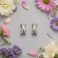 crossed earrings